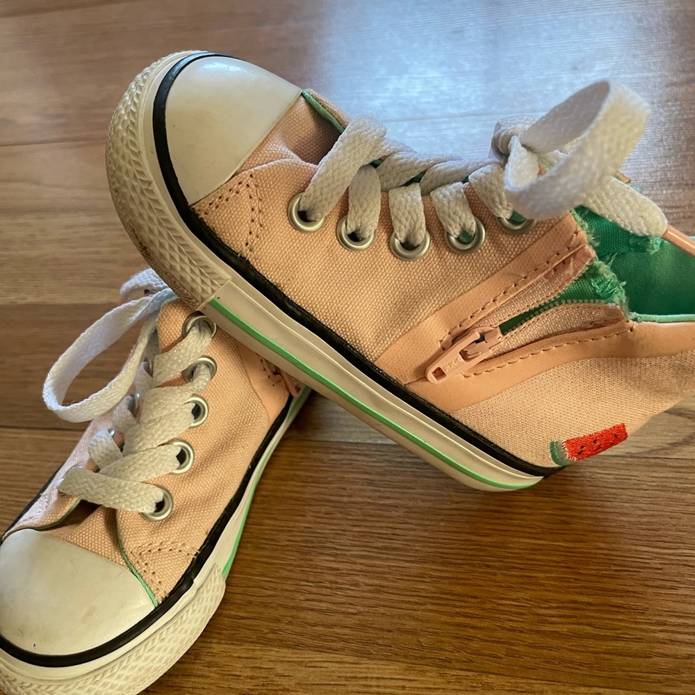 Cute Converse light pink with watermelon embroidered.  Used one time.